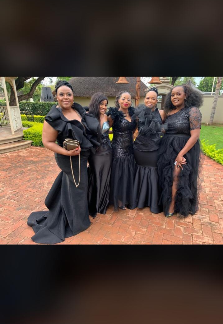 Group in black occasion gowns