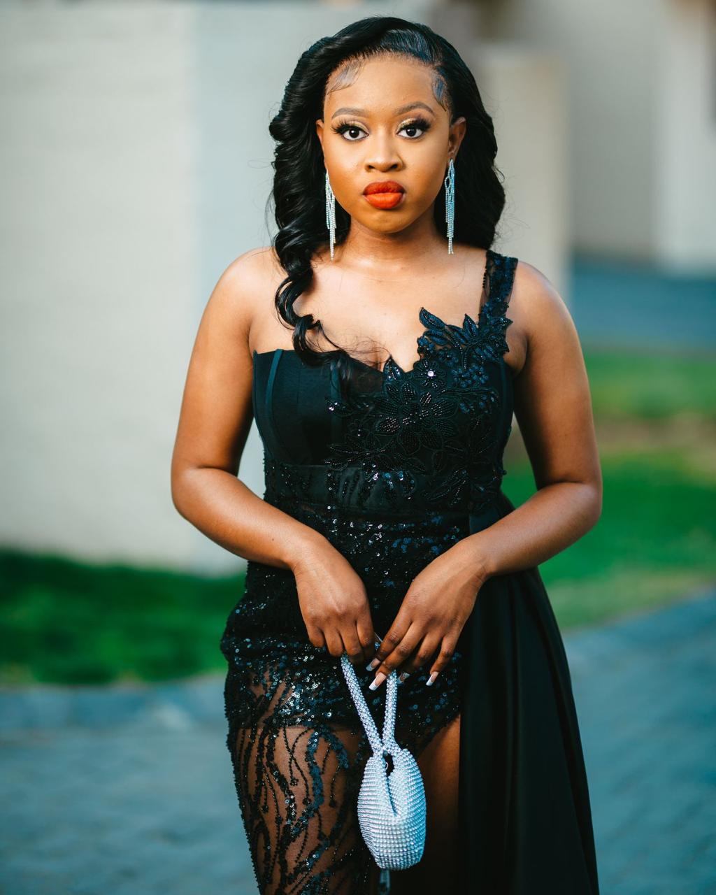 Black sequinned gown with sheer beaded detail