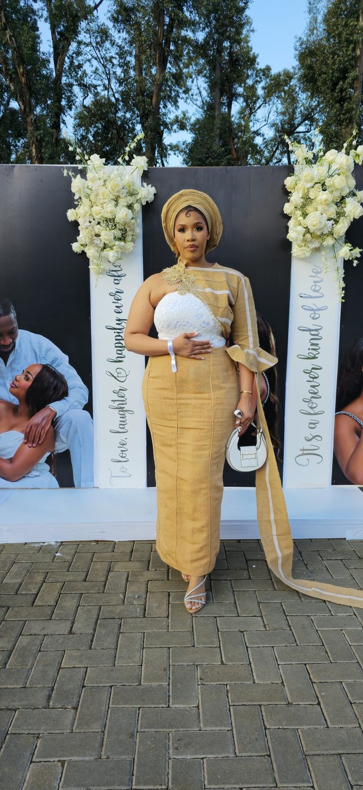 Mustard occasion dress styled with gele