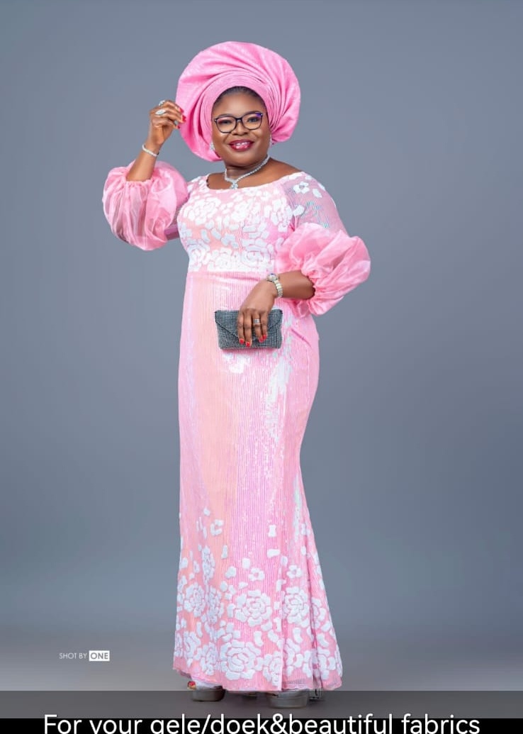 Sequinned gown styled with a matching gele by Juliet Eron