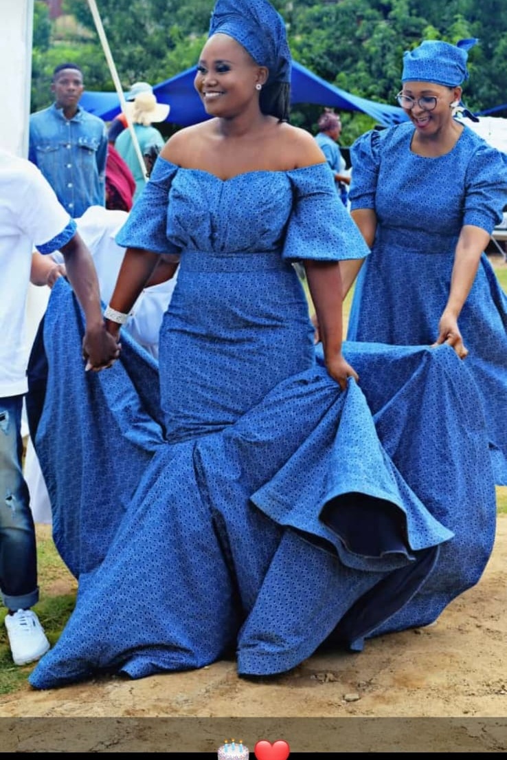 Off-shoulder traditional-print bridal gown by Juliet Eron